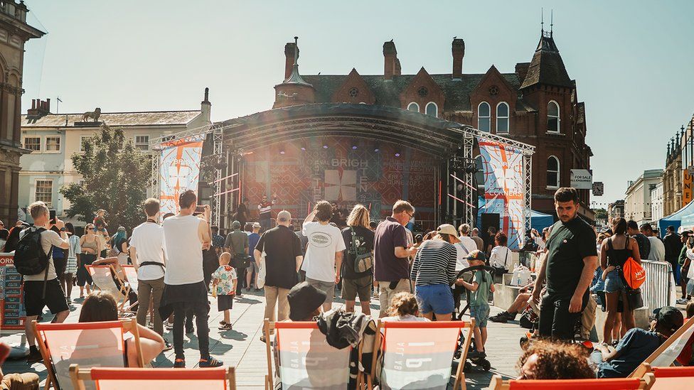 A crown in front of a BTS stage on the Cornhill in Ipswich