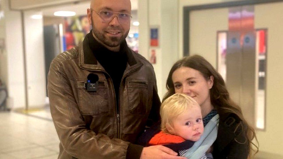 Dr Kamil Shultz reunited with his wife and son