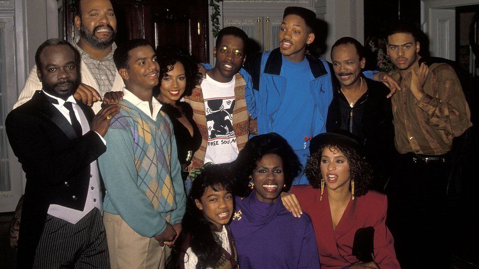 The Fresh Prince of Bel Air team, including executive producer Quincy Jones, take a break from filming in 1990