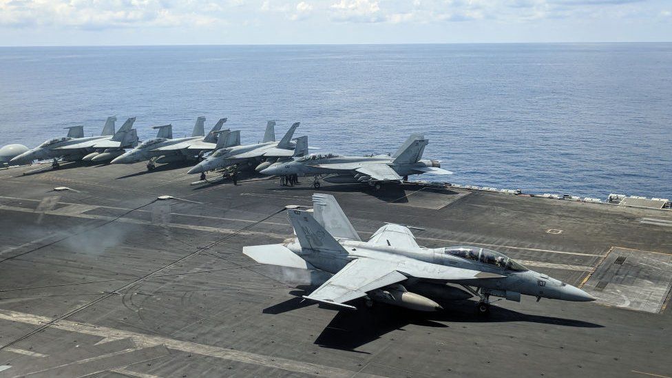 The USS Ronald Reagan as it sails through the South China Sea