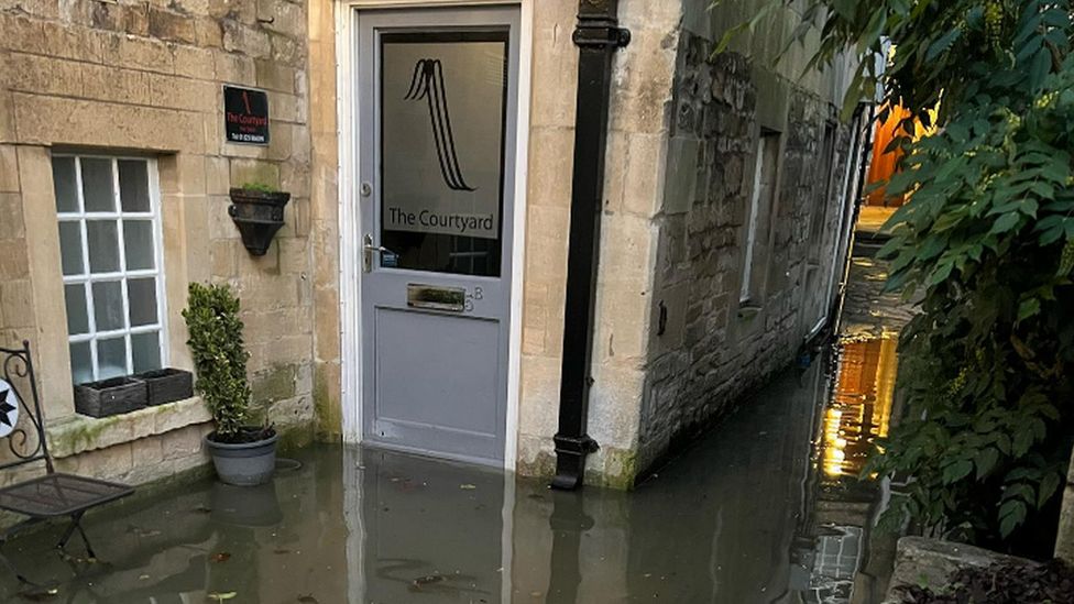 The Courtyard Hair Salon surrounded by flood water