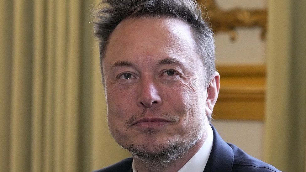 Elon Musk poses prior to his talks with French President Emmanuel Macron (not in picture), at the Elysee Palace in Paris, 15 May 2023