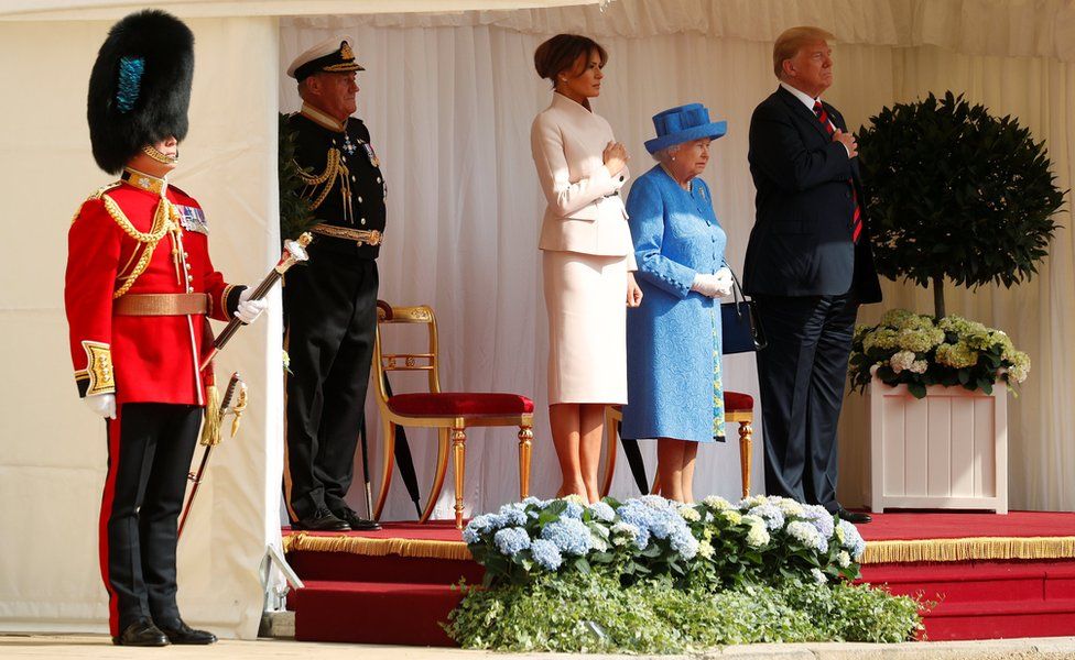 US President Donald Trump and the First Lady Melania Trump are met by Britain's Queen Elizabeth