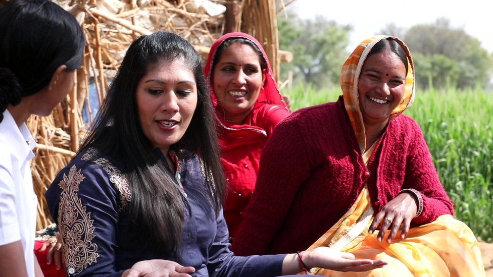 Ajaita Shah, founder of Frontier Markets with three Solar Sahelis
