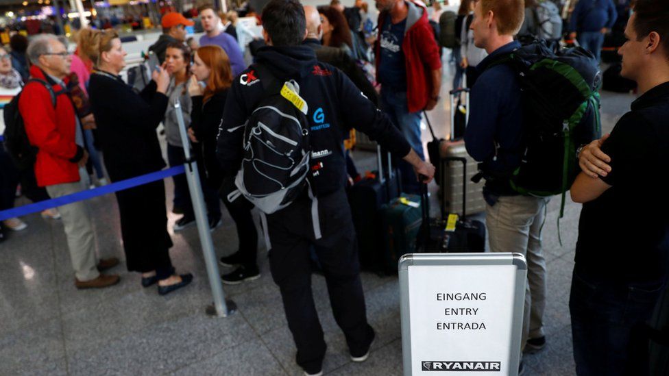Ryanair passengers queuing during strike
