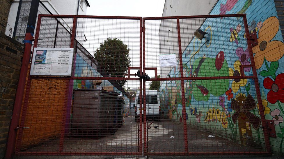 A gate is left locked at a Kids Company premises on August 5, 2015 in Camberwell, south London