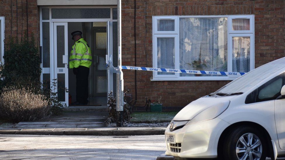 Police officers at Petherton Court in Kettering