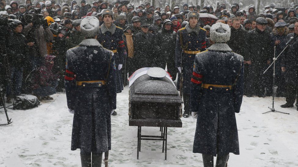 A funeral ceremony for the pilot of a Russian jet downed by Turkey