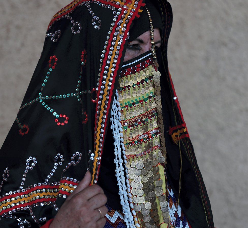 A Bedouin woman sells handicrafts and souvenirs at Ras Mohamed national park , South Sinai, near Sharm El-Sheikh, Egypt, 25 September 2020