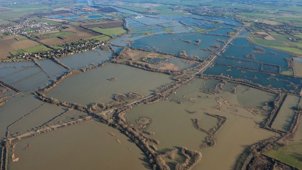 View of 2014 flooding of the Great Ouse River over Fen Drayton looking northeast towards Holywell