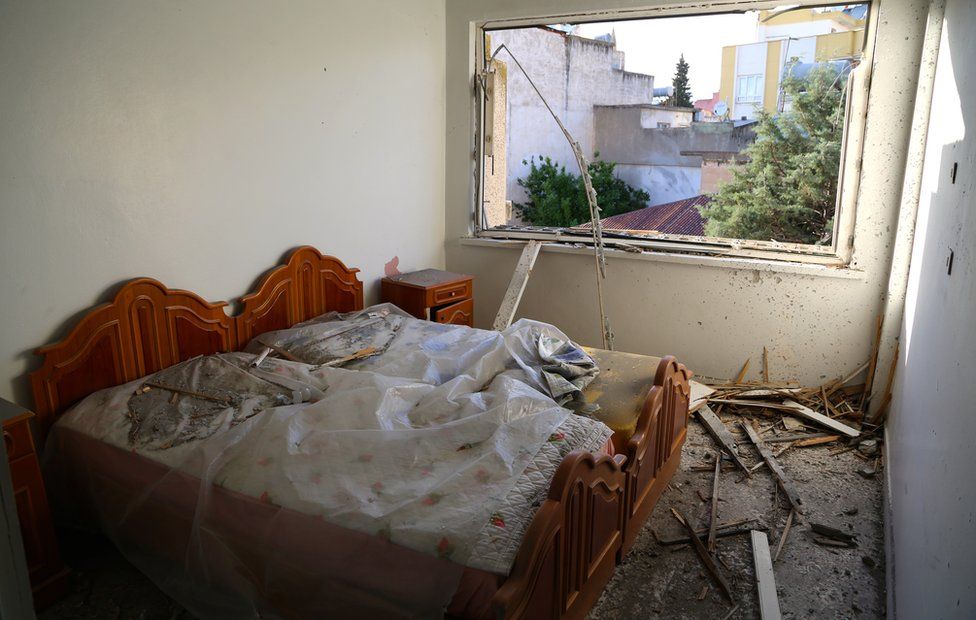 Rubble in a room hit by rocket in Turkish town of Kilis