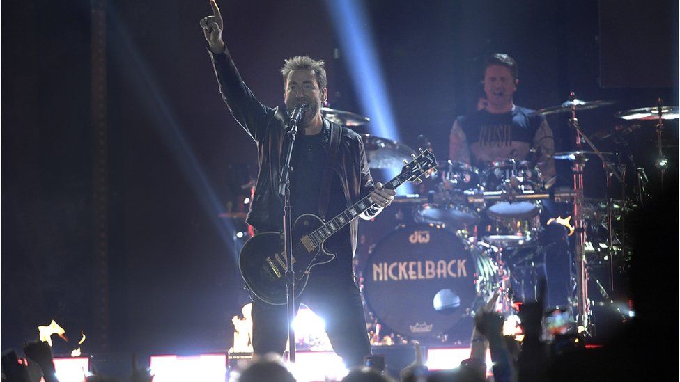 Nickelback performing onstage at the Juno Awards