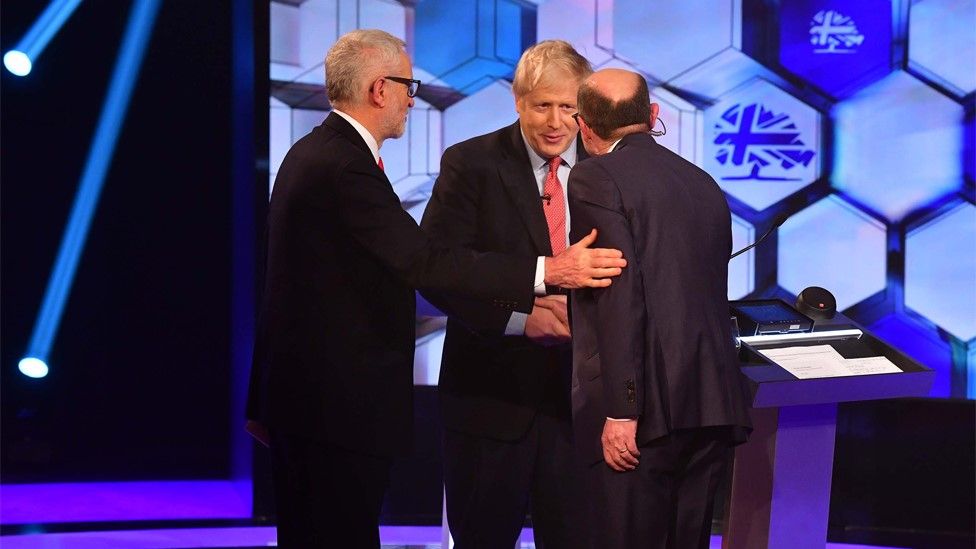 Jeremy Corbyn, Boris Johnson and moderator Nick Robinson