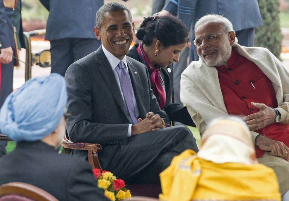 US President Barack Obama smiles alongside Indian Prime Minister Narendra Modi (R) during a reception at Rashtrapati Bhawan, the Presidential Palace, in New Delhi on January 26, 2015