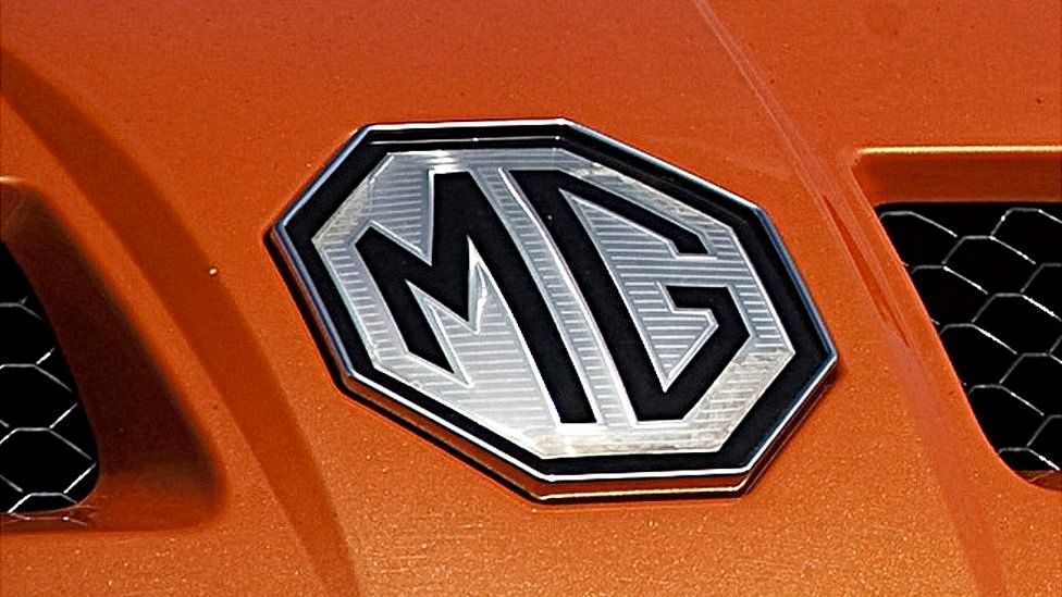 The MG Rover logo connected  a sports car.