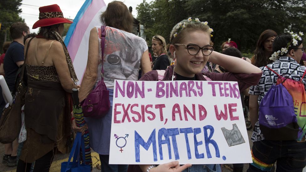 Gender non-binary teen who doesn't fit either male or female genders, prepares for Atlanta Pride parade