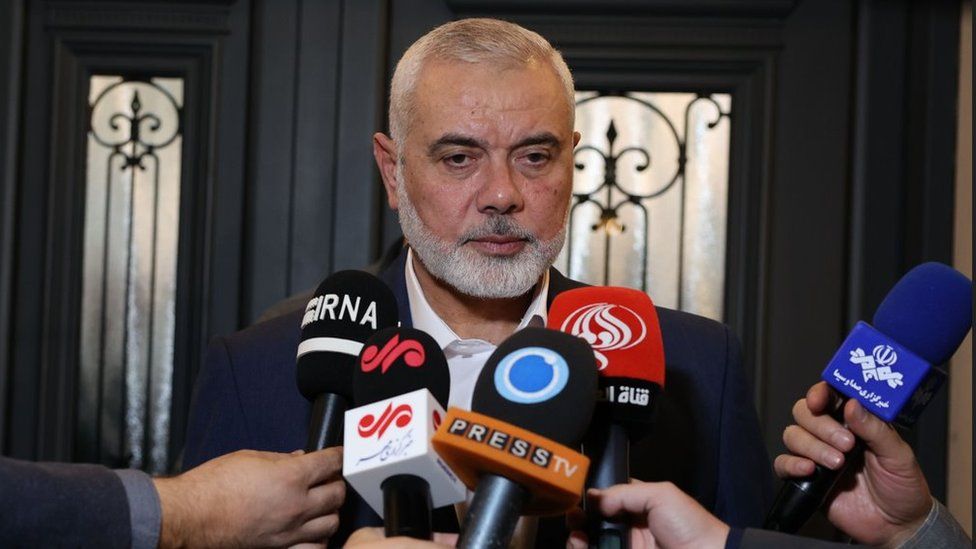 File photo showing Hamas political leader Ismail Haniyeh speaking to Iranian journalists in Doha, Qatar (20 December 2023)
