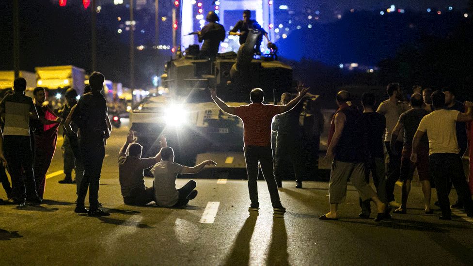 Turks take over a tank near the Fatih Sultan Mehmet bridge in Istanbul on July 16