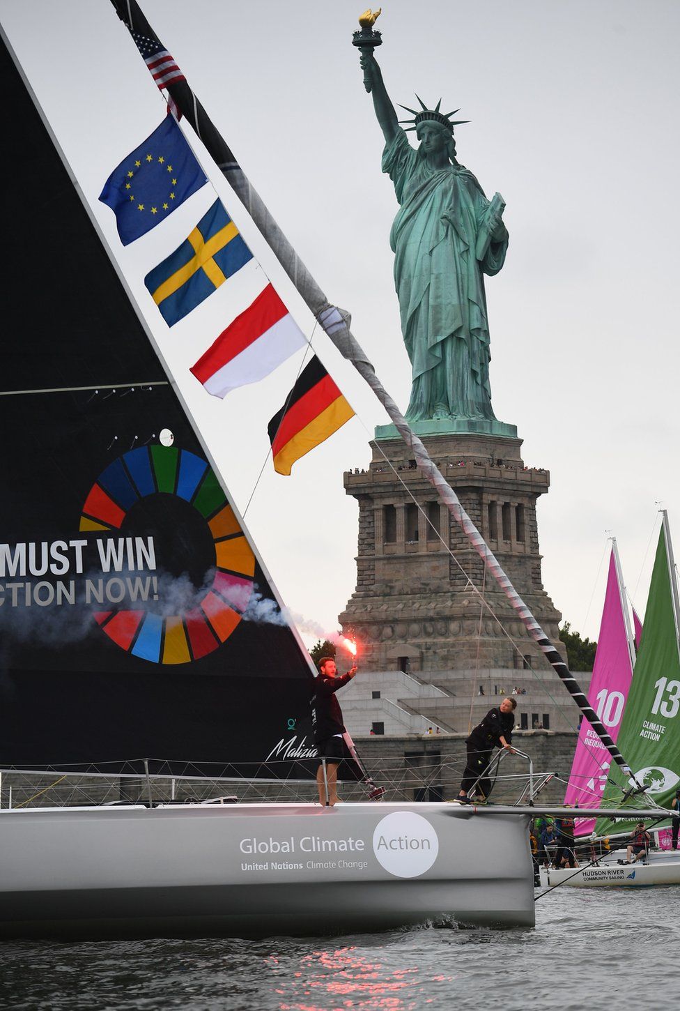 Greta Thunberg arrives in the US on a yacht, passing the Statue of Liberty