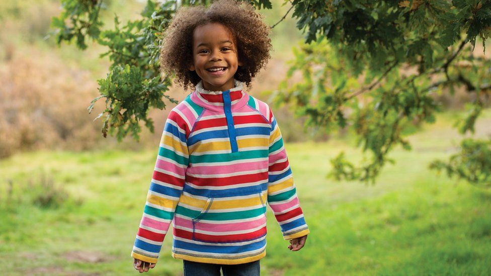 A child wearing Frugi clothing
