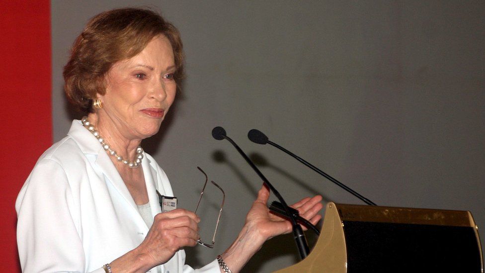 Former US first lady Rosalynn Carter at a podium in New Delhi