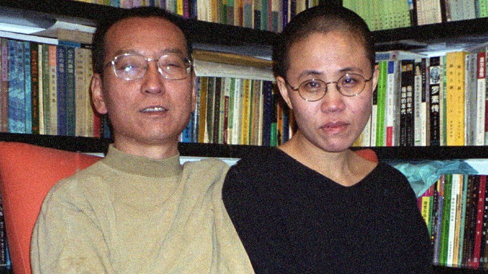 Chinese dissident and Nobel Peace laureate Liu Xiaobo (L) and his wife Liu Xia in Beijing in October 2002