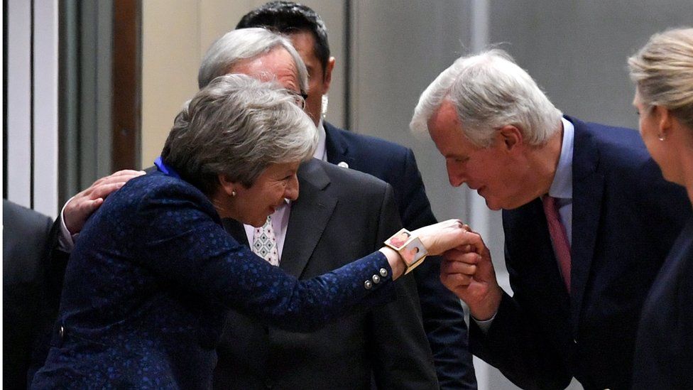Theresa May, Michel Barnier and Jean-Claude Juncker in Brussels