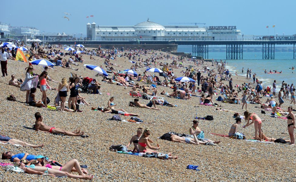 People on the beach in Brighton