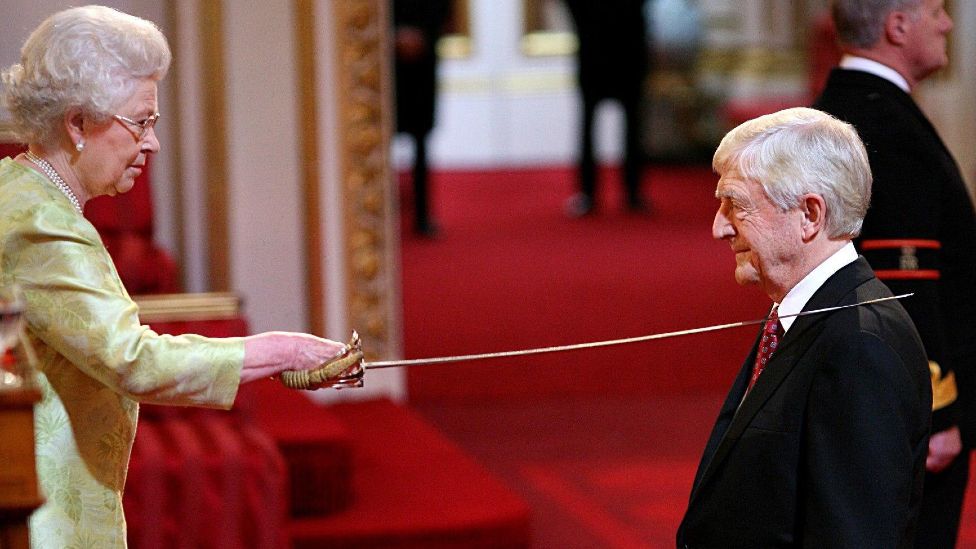 File photo dated 04/06/2008 of Sir Michael Parkinson receiving his Knighthood from Queen Elizabeth II at Buckingham Palace in London. Sir Parkinson has died at the age of 88. Issue date: Thursday August 17, 2023