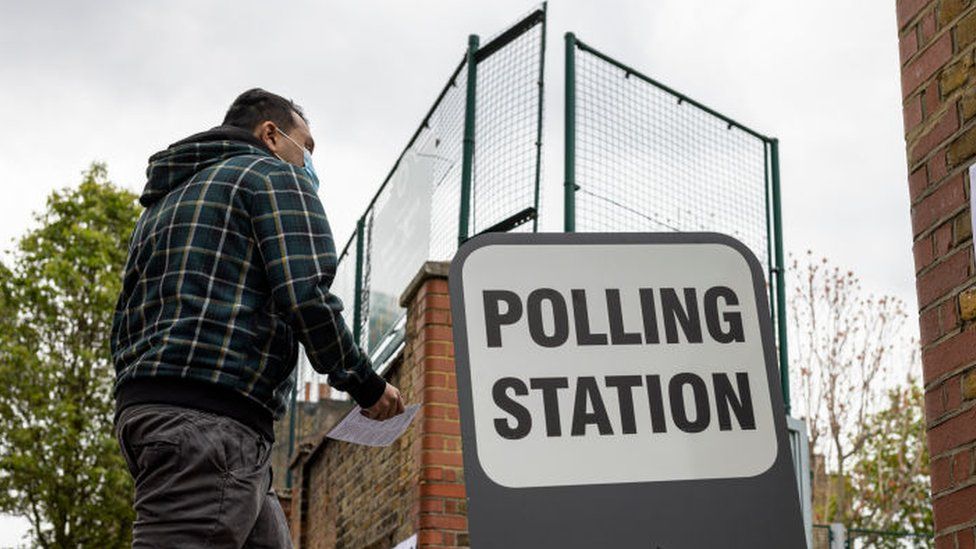 Man arriving at a polling station