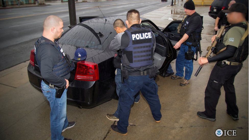 US immigration agents detain a suspect in Los Angeles, California, on 7 February 2017