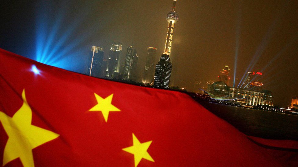 Chinese flag and Shanghai skyline