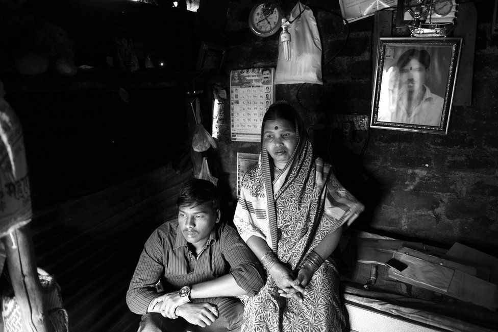Manik Udage's brother, Shravan, and his mother at their home