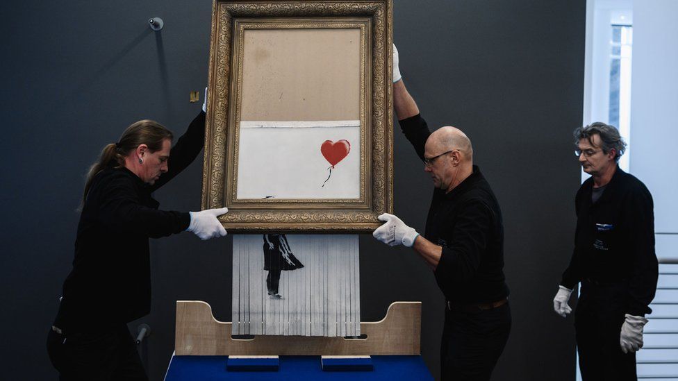 Banksy was warned about website flaw before NFT hack scam - BBC News