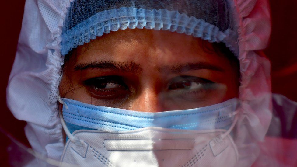 A nurse wearing PPE