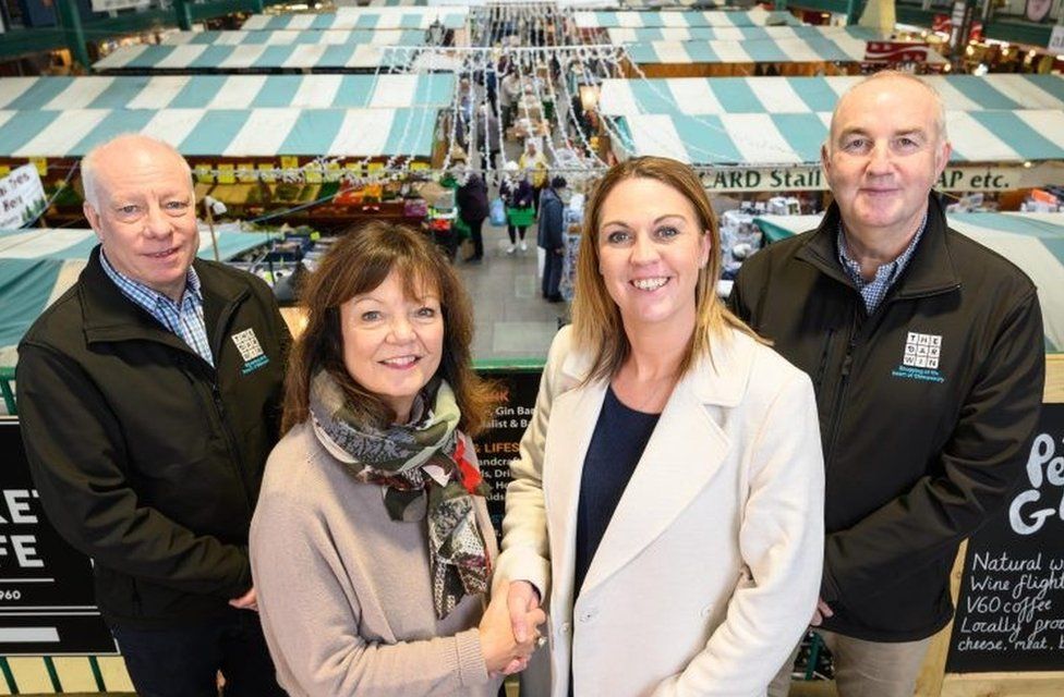 Kate Gittins (front left) hands over the management reins of Shrewsbury Market Hall to (from left) Russell Hall, Amy Williams and Kevin Lockwood