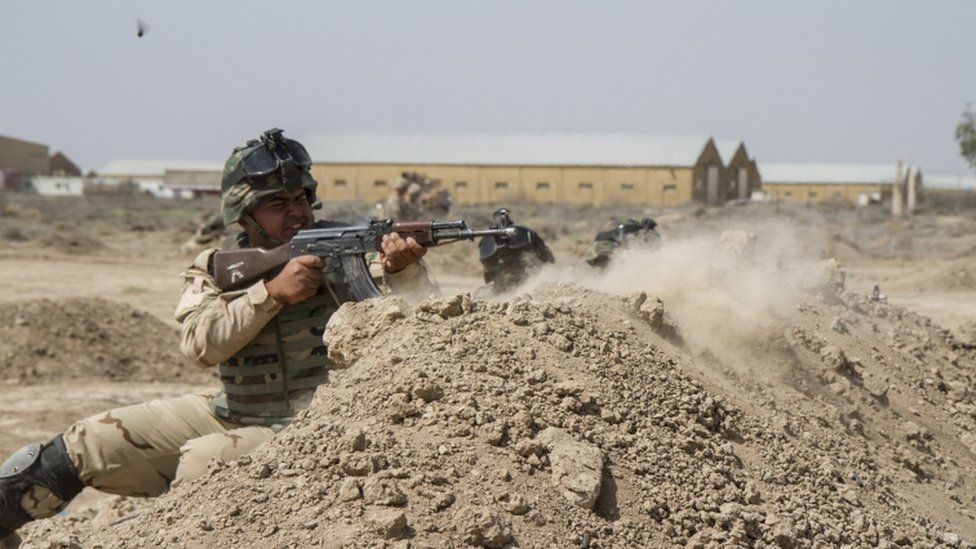 Iraqi troops train with US soldiers at the Taji base. File image
