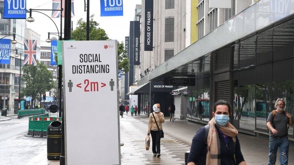 Social distancing sign in London's Oxford Street