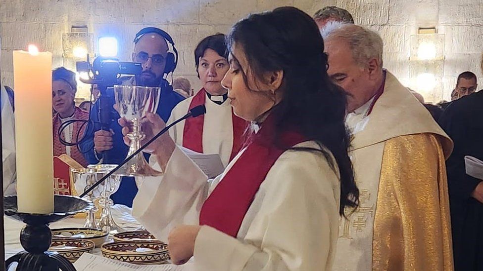 Sally Azar takes part in a service at the Lutheran church in Jerusalem
