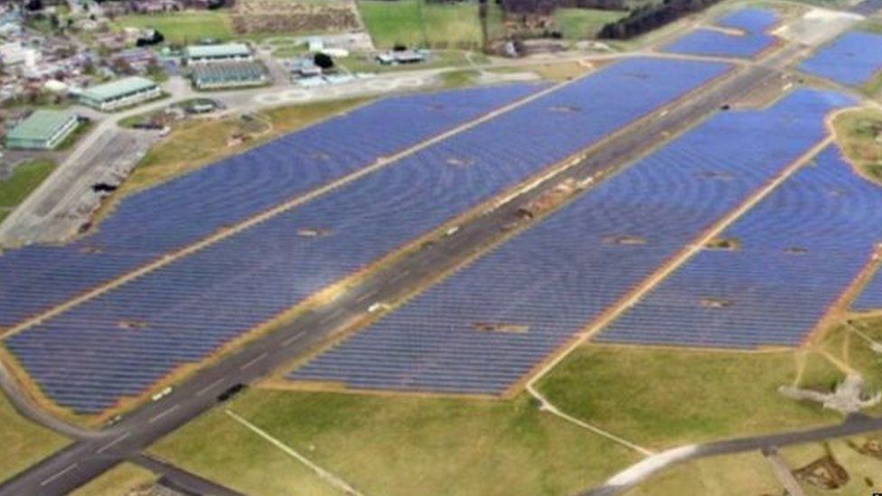 Former runway at RAF Coltishall surrounded by solar energy panels