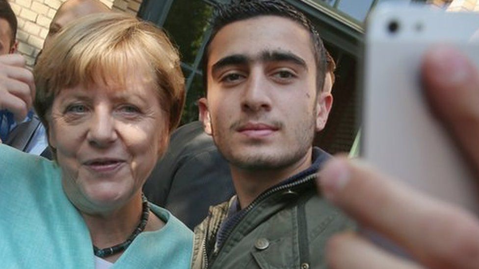 Mr Modamani in a selfie with Angela Merkel