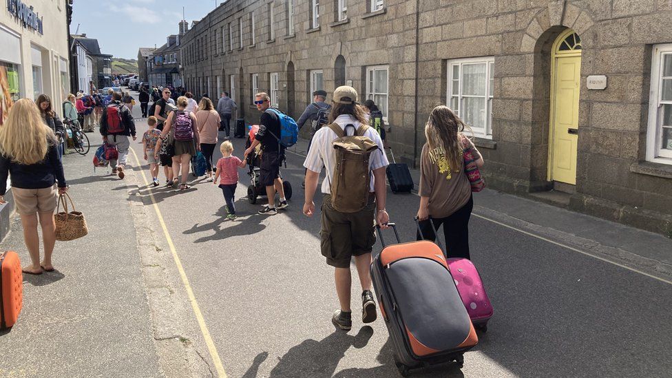 Ferry passengers who have just arrived