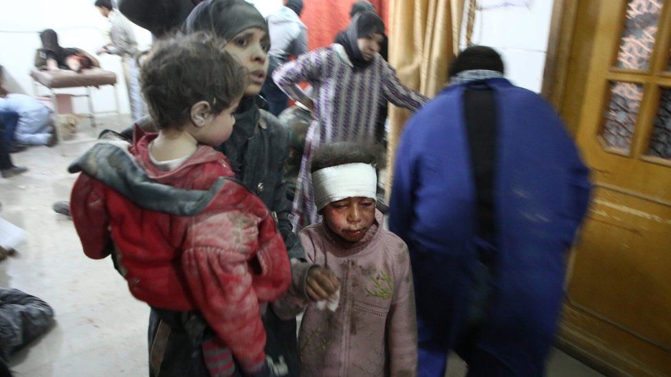 Wounded Syrians seek treatment at a makeshift hospital in Kafr Batna, in the besieged rebel-held Eastern Ghouta, following reported Syrian government air strikes (21 February 2018)