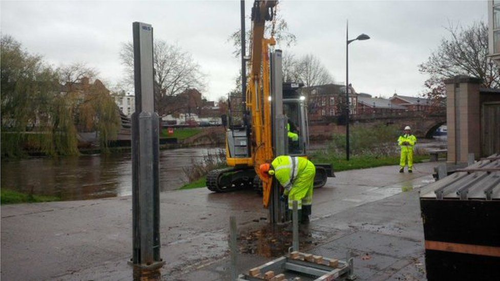 Frankwell flood barriers being erected