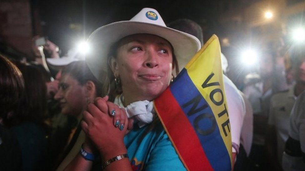 "No" supporters gather at a rally following their victory in the referendum on a peace accord to end the 52-year-old guerrilla war between the FARC and the state on October 2, 2016 in Bogota, Colombia.