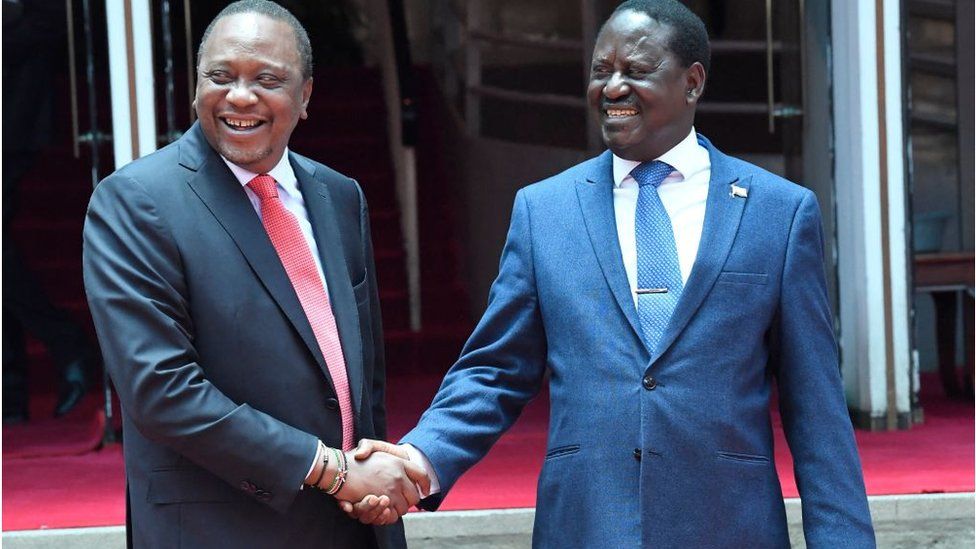 Kenyatta and Odinga shaking hands
