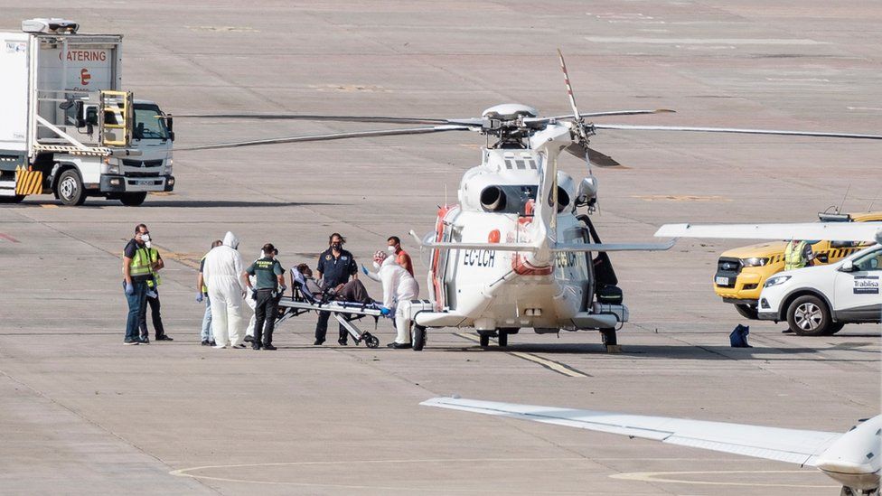 A woman is evacuated in helicopter after being rescued in Telde, Gran Canaria, Canary Islands, Spain, 19 August 2021
