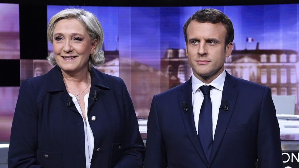 Emmanuel Macron (R) and Marine Le Pen on 3 May