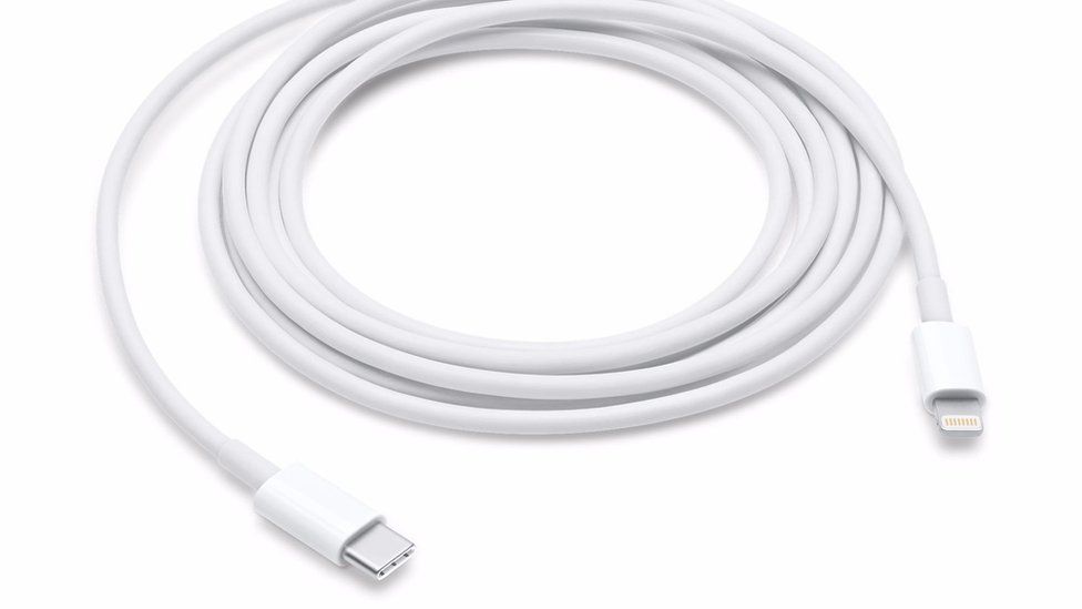 A cable to connect the iPhone to the new Macbook