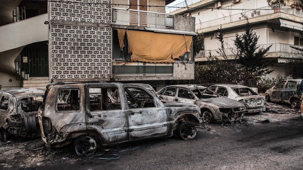 Damaged vehicles in Rafina, Greece